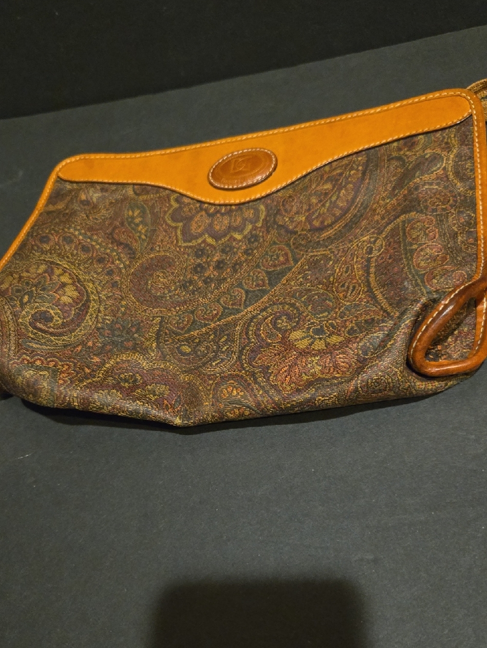 A DELL GOBBO PAISLEY PRINT FABRIC/LEATHER PURSE